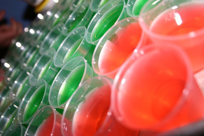 Image: rows of brightly colored Jell-o shots
