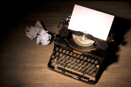 Image: blank paper in a typewriter