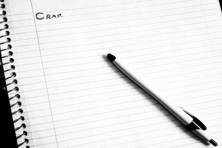 Image: open notepad with the word "Crap" written on the first line