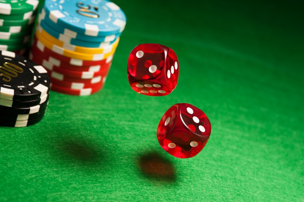 Image: tumbling dice on a casino table