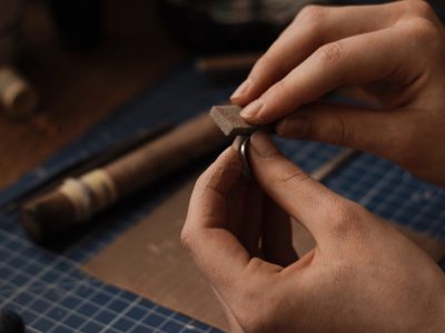 Image: jeweler polishing a ring