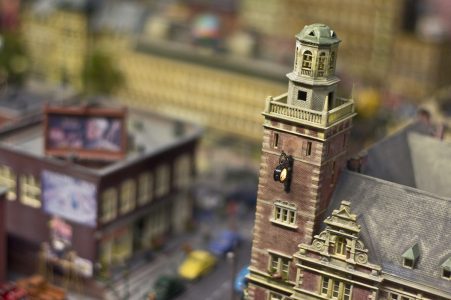 Image: close-up of a clock tower in a miniature city