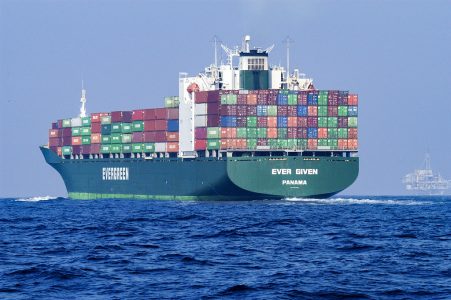 Image: a loaded container ship on the ocean