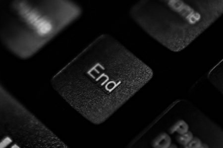 Image: close-up photo of the End key on a computer keyboard.